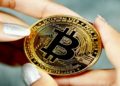 Holding a bitcoin