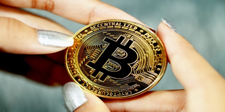 Holding a bitcoin