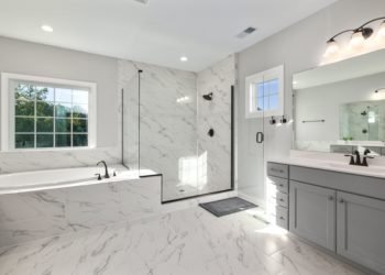 What are the benefits of using toughened glass for shower screens?