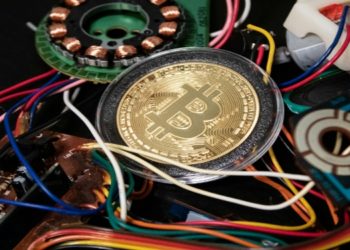 Bitcoin Gold Coin and Electrical Wires