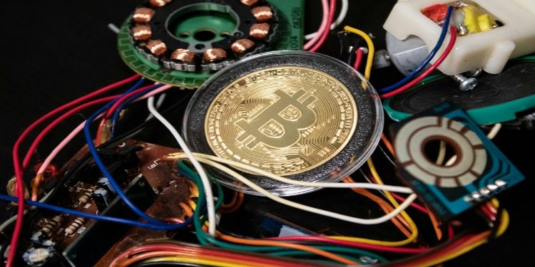 Bitcoin Gold Coin and Electrical Wires