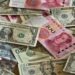 Pile of Yuan and Dollar Cash