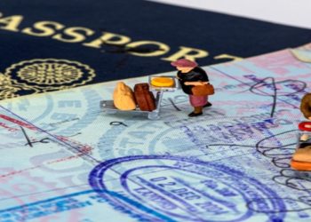 Passport Visa and little traveler Figurines