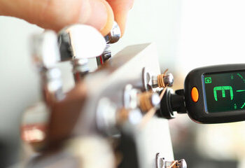 How To Use A Guitar Tuner? (Types, Process, and Alternatives)
