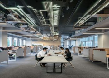 Employees working in a big office