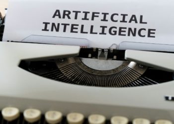 Artificial intelligence displayed on a vintage typewriter with the words "Artificial Intelligence"