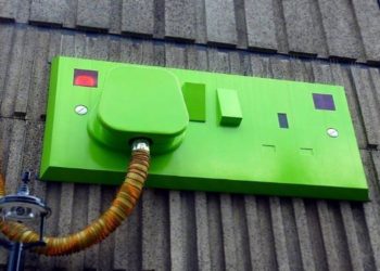 Exterior view of a green electrical outlet