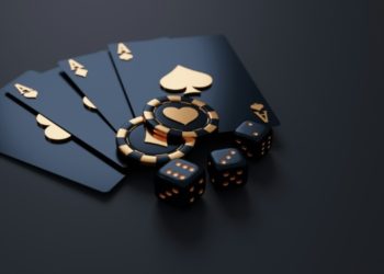 Poker chips and dice scattered on a smooth black surface, creating a striking contrast.
