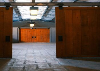 How to Transform Your Open-Plan Living Space Using Barn Doors as Stylish Room Dividers