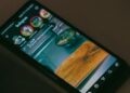 Smartphone showing the Instagram app on a desk