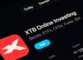 XTB Online Investing app on the App Store shown on a tablet screen